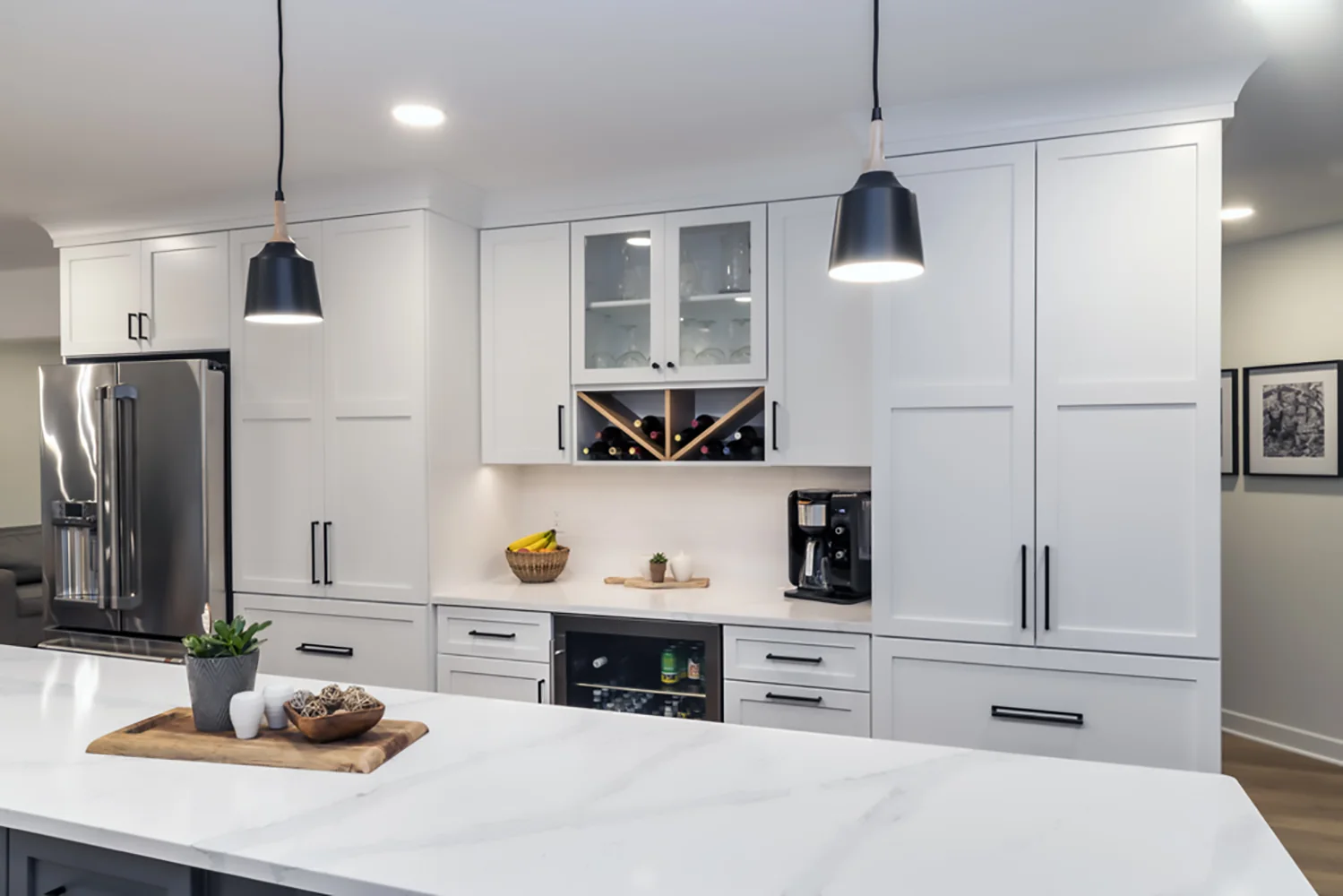 Tall pantry cabinetry with integrated wine storage