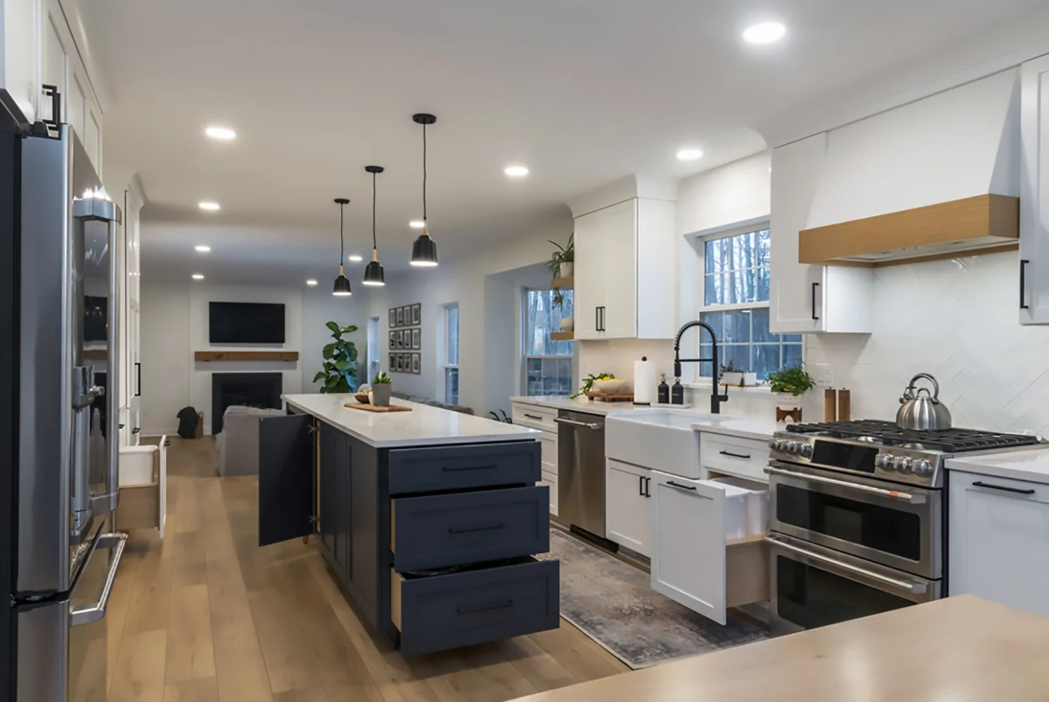 Deep blue island with an open storage drawer