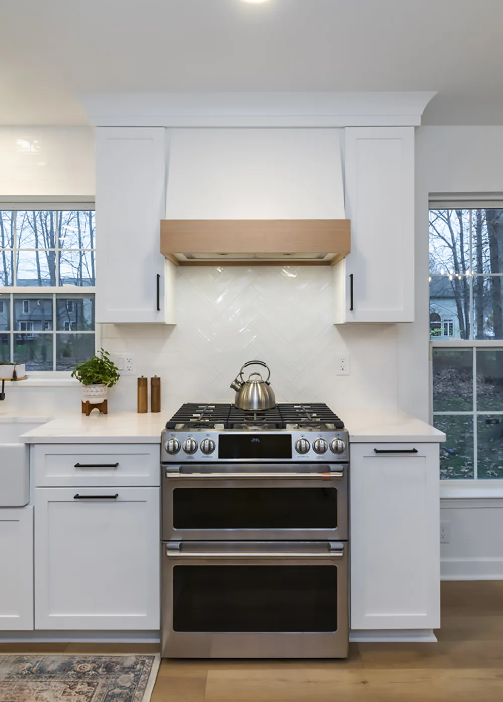 White range wall framed by windows