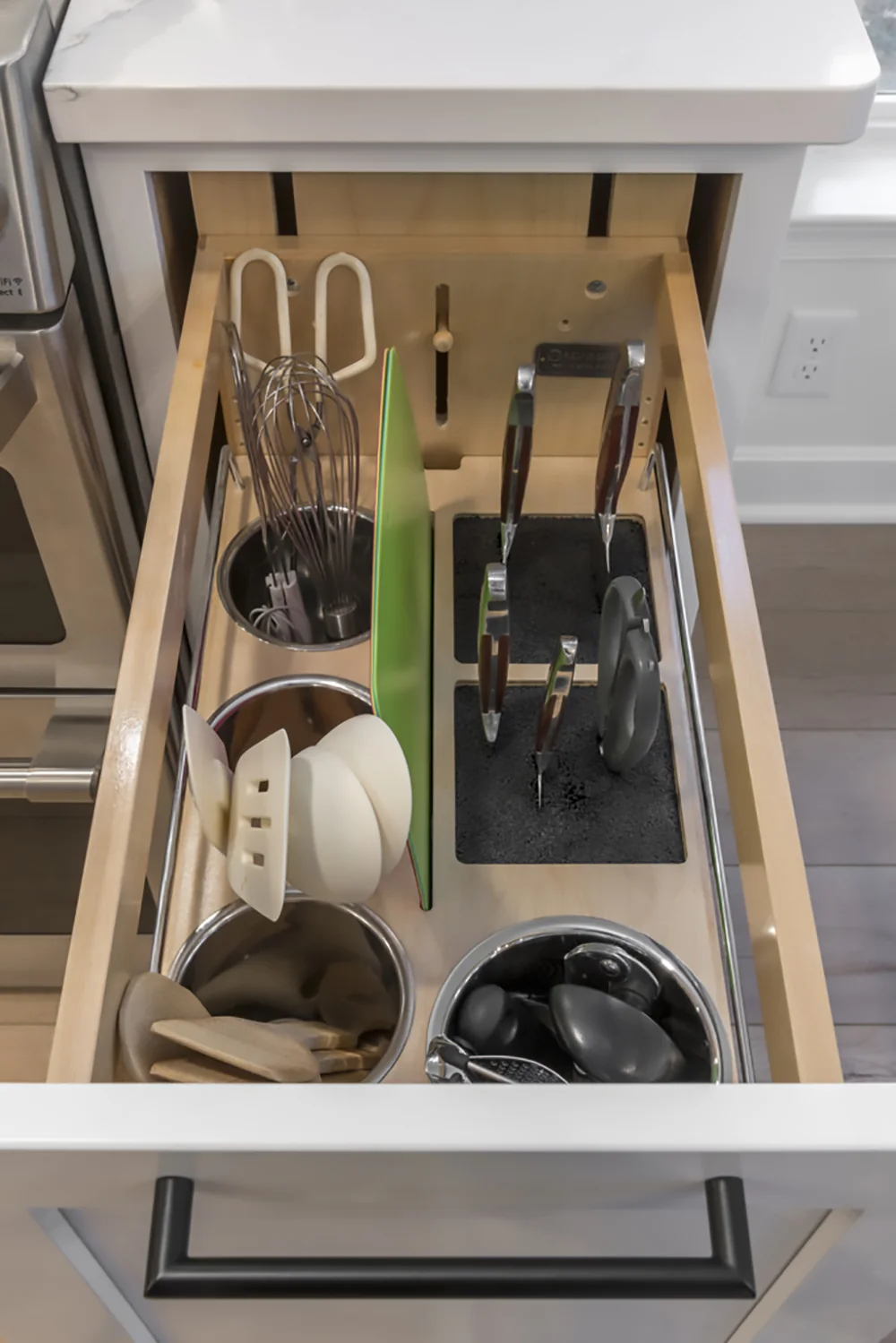 Organized utensil drawer with custom dividers