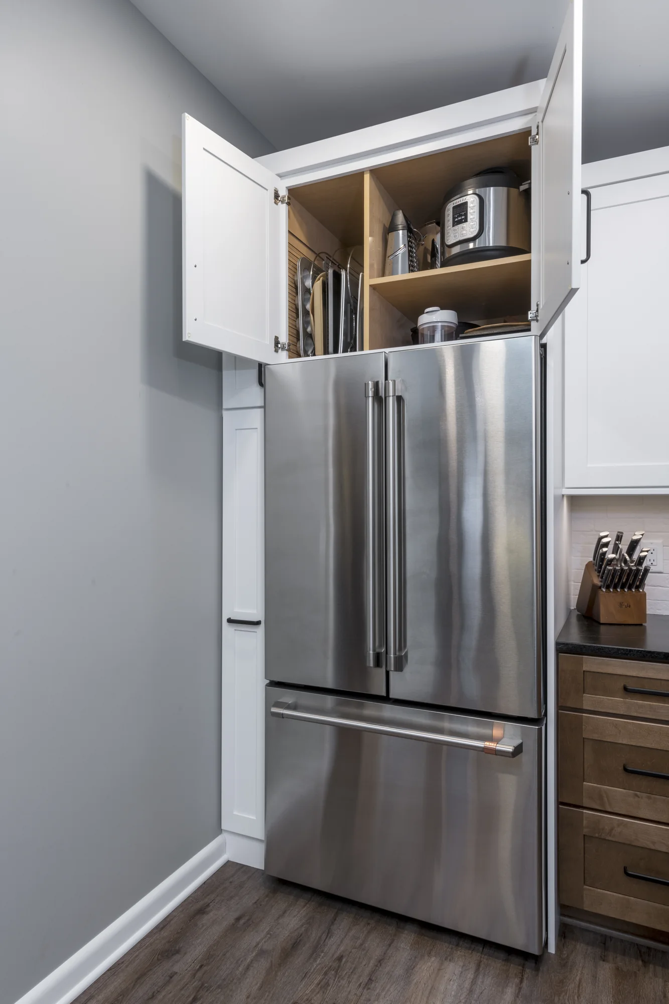 Cabinet storage above the refrigerator