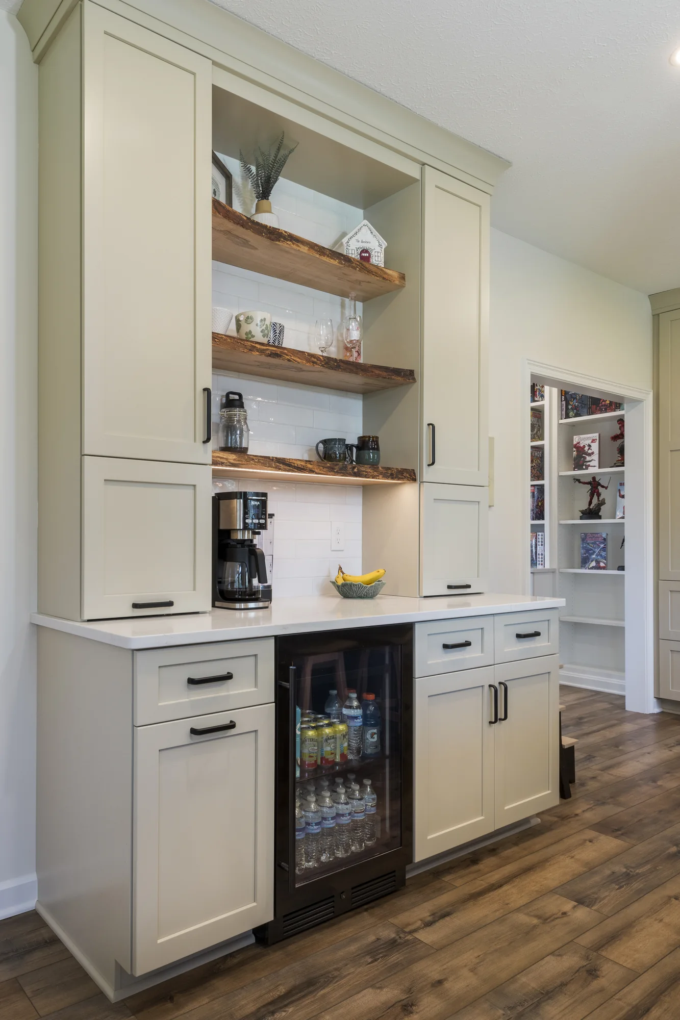 Built-in beverage center with natural wood shelves