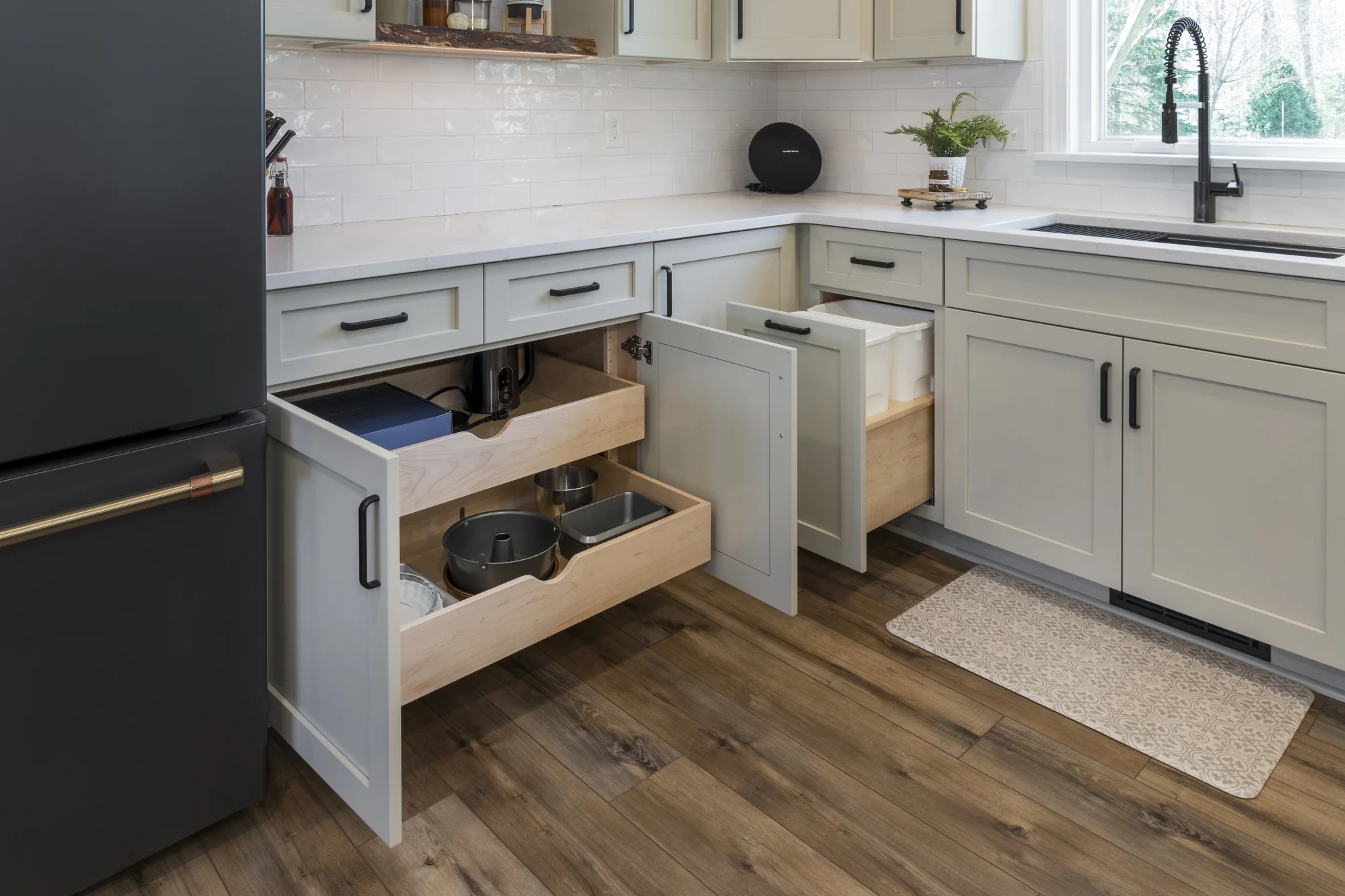 Custom pull-out storage beside the refrigerator
