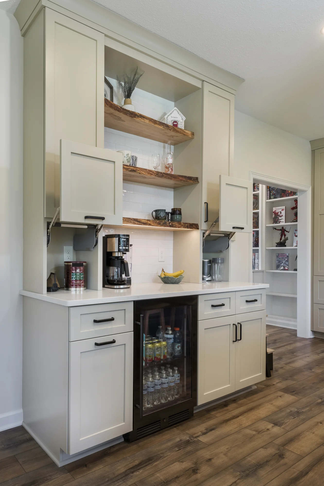 Beverage center with concealed storage open